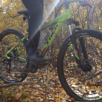 Mountain biking beside creek at RockRidge Canyon, Princeton BC